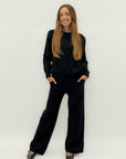 Completo maglia treccia e pantalone – Stile e comfort invernale