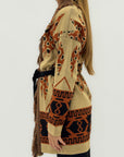 Cardigan fantasia etnica con cintura e frange
