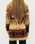 Cardigan fantasia etnica con cintura e frange
