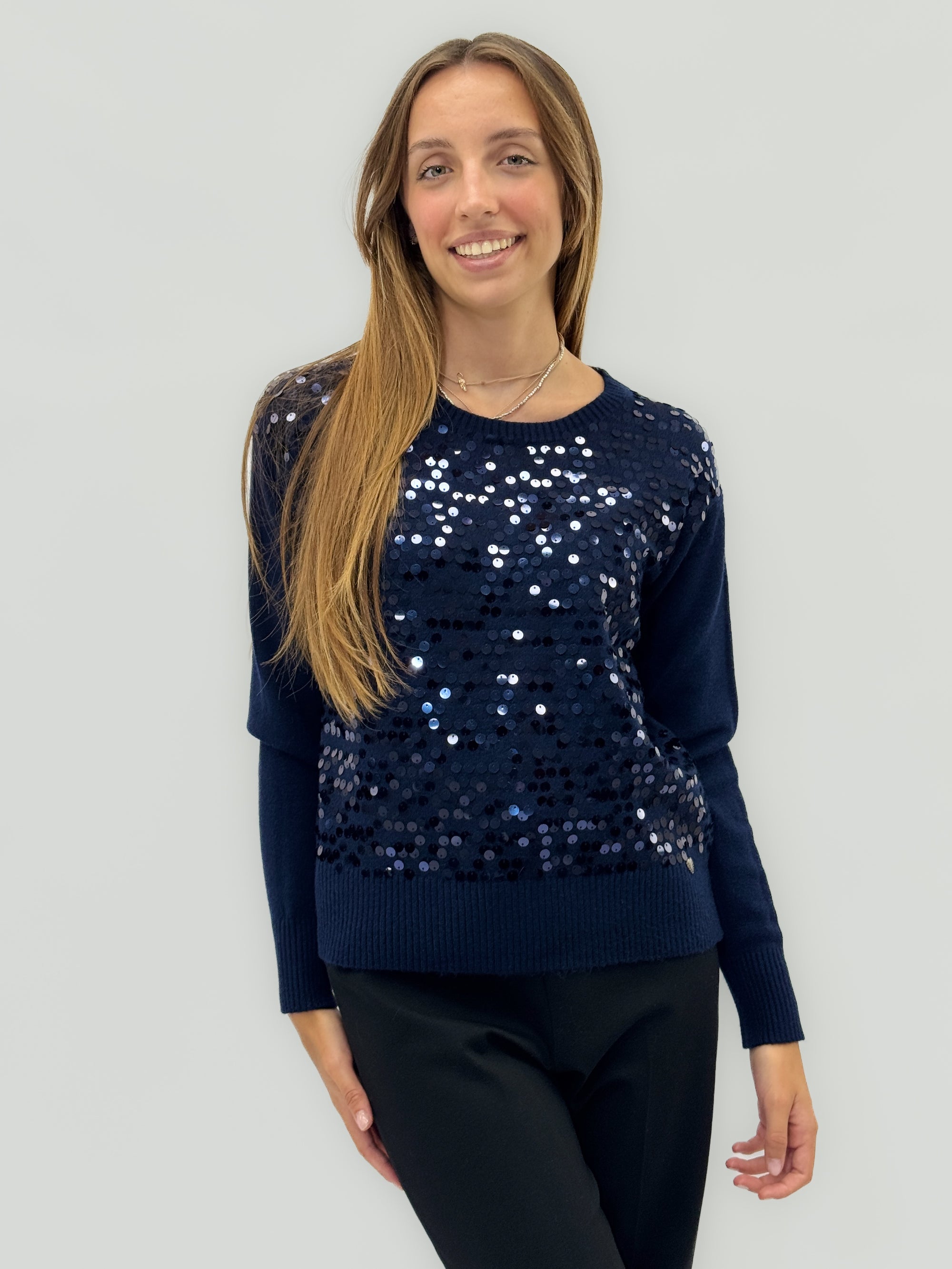 Maglione con paillettes – Eleganza luminosa