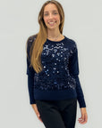Maglione con paillettes – Eleganza luminosa