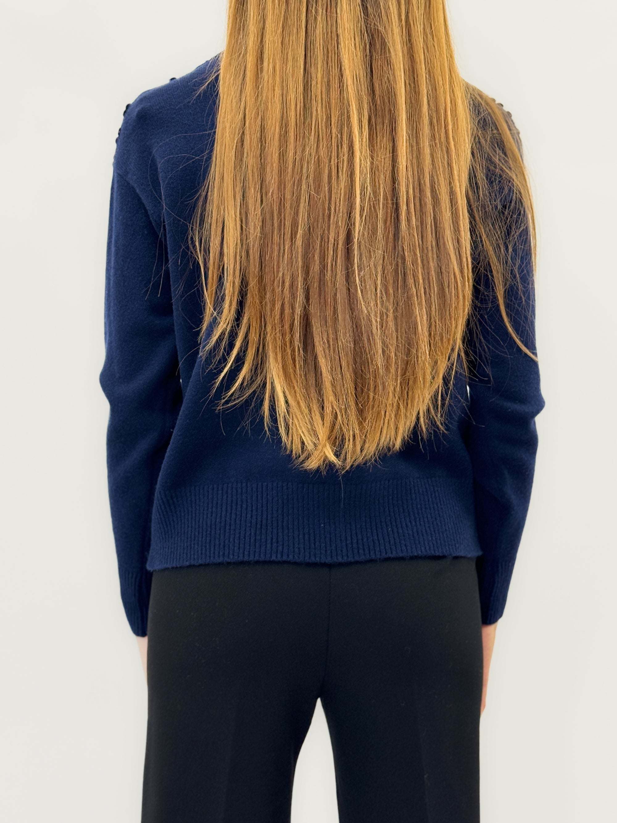 Maglione con paillettes – Eleganza luminosa