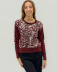 Maglione con paillettes – Eleganza luminosa