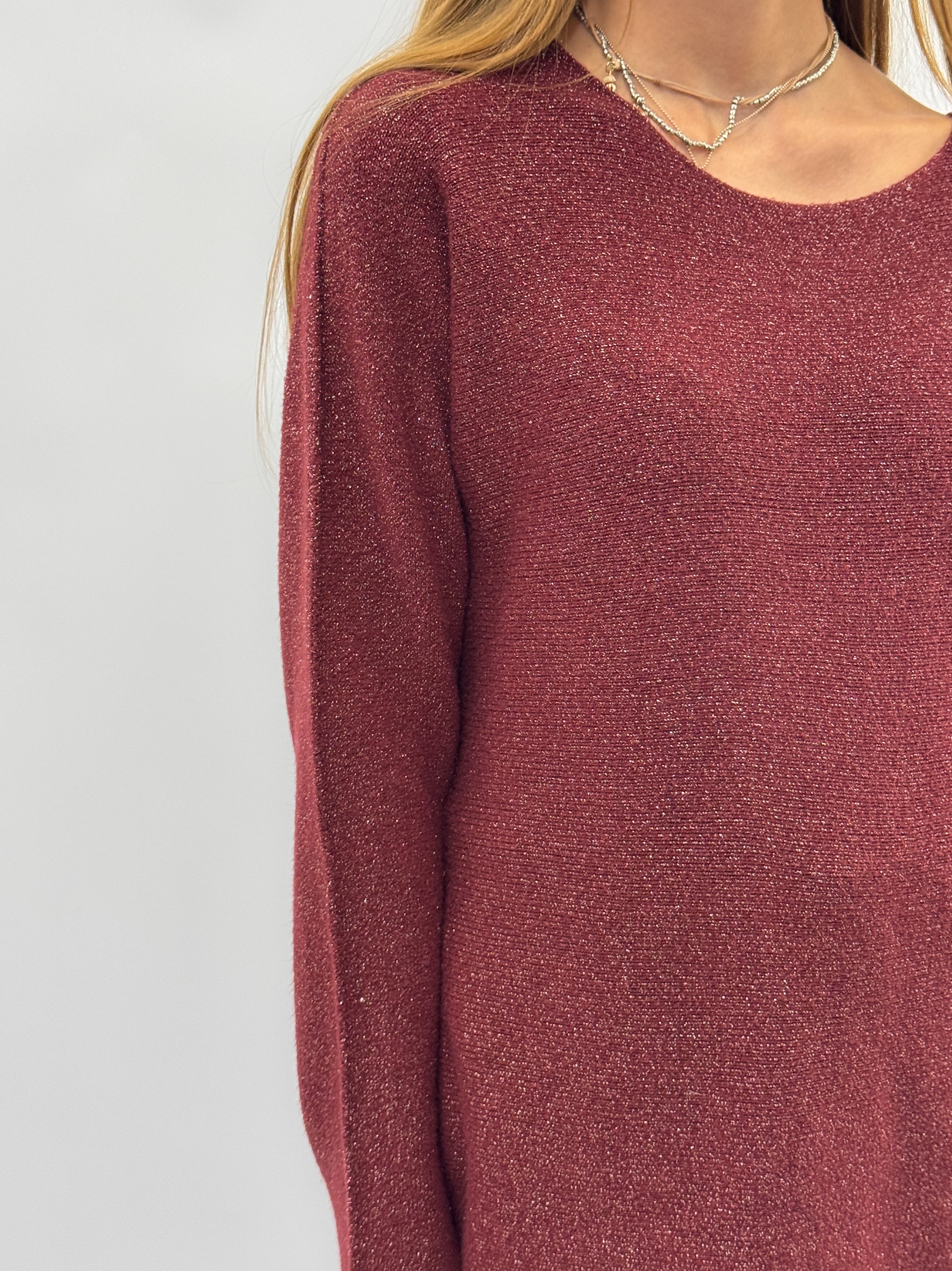 Maglia lurex – Eleganza luminosa e comfort quotidiano