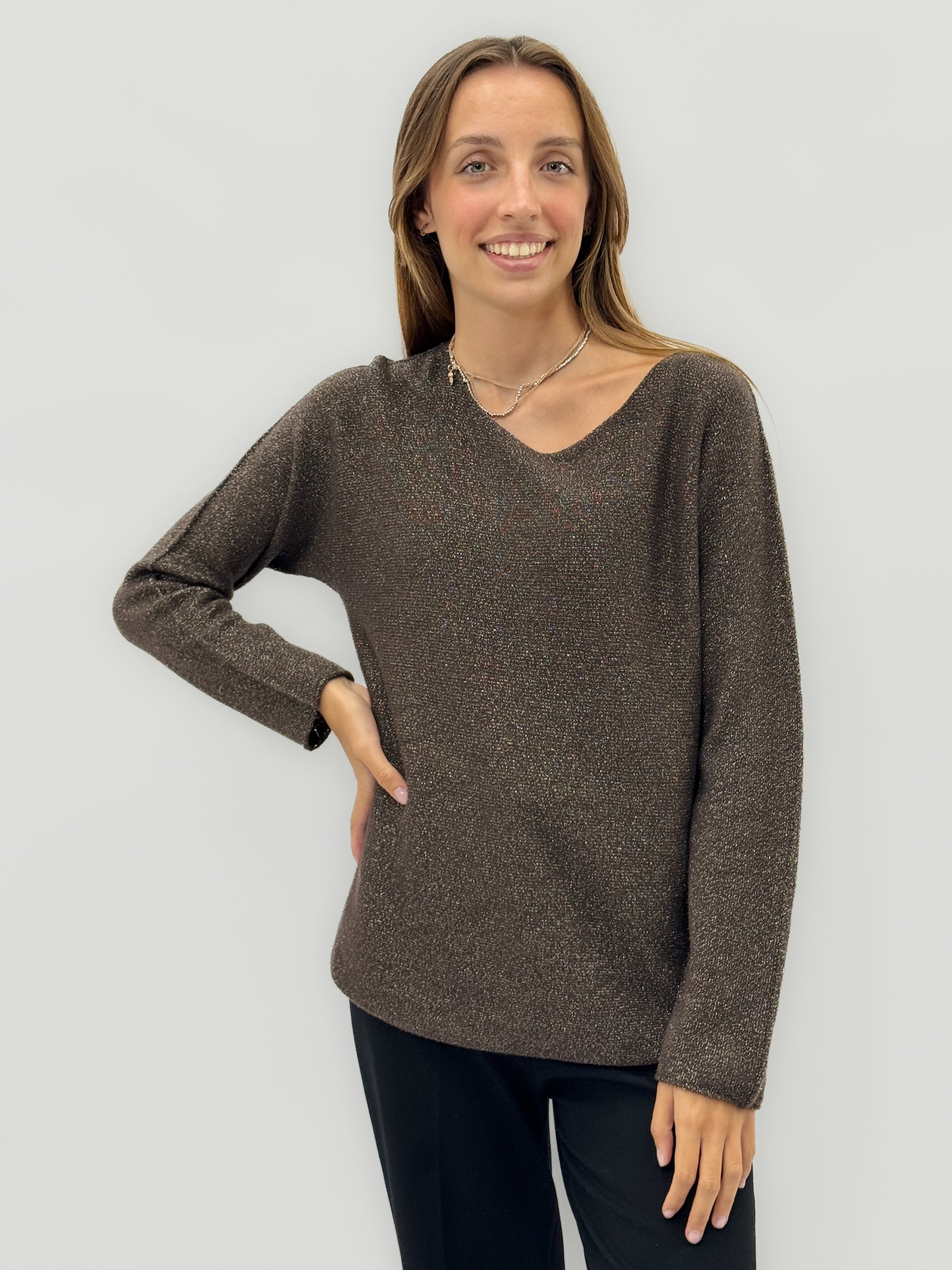 Maglia lurex – Eleganza luminosa e comfort quotidiano