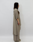 Completo maglia lunga e pantaloni taglia comoda