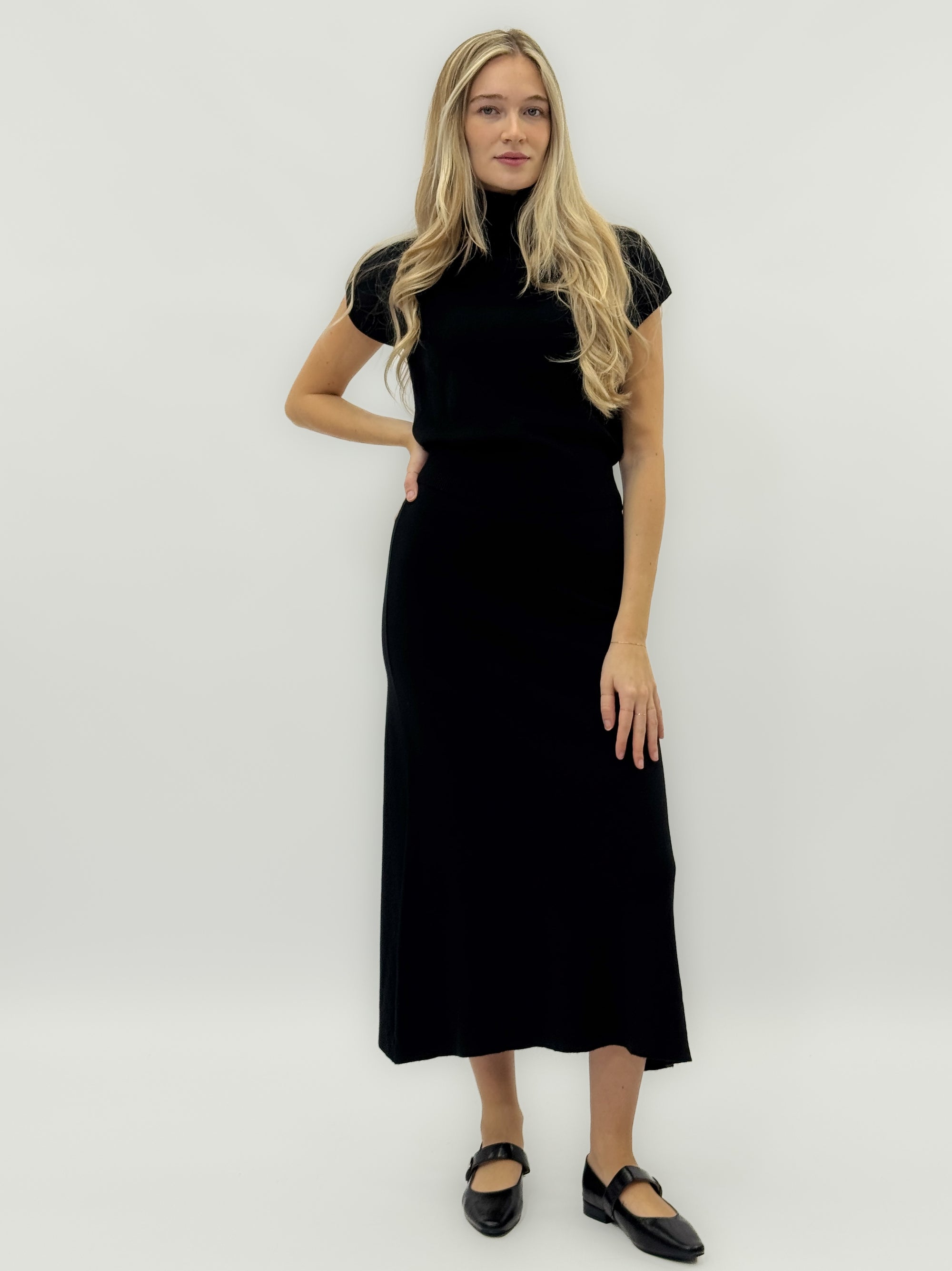 Completo in maglia con gonna lunga – Collo alto e linea svasata
