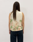 Maglia smanicata con fiocco