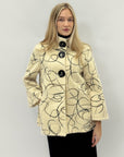 Cappotto fantasia con maxi bottoni – Stile elegante e ricercato