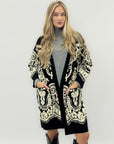 Cappotto in maglia jacquard con motivo floreale