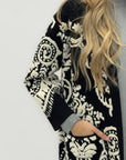 Cappotto in maglia jacquard con motivo floreale