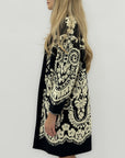 Cappotto in maglia jacquard con motivo floreale