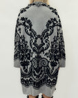 Cappotto jacquard con frange – Stile boho chic e calore avvolgente