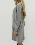 Coordinato abito e cardigan – Eleganza semplice e comfort assoluto