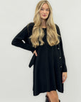 Coordinato abito e cardigan – Eleganza semplice e comfort assoluto