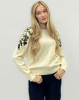 Maglia con ricamo in rilievo – Stile unico e sofisticato
