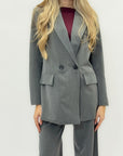 Completo tailleur giacca e pantalone – Taglio palazzo e blazer doppiopetto