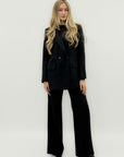 Completo tailleur giacca e pantalone – Taglio palazzo e blazer doppiopetto