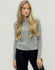 Cardigan in maglia a trecce – Eleganza senza tempo