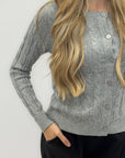 Cardigan in maglia a trecce – Eleganza senza tempo