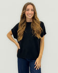 Maglia smanicata morbida – Stile minimal e versatilità assoluta