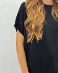 Maglia smanicata morbida – Stile minimal e versatilità assoluta