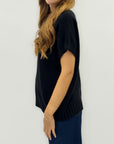 Maglia smanicata morbida – Stile minimal e versatilità assoluta