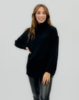 Maglione dolcevita oversize – Con bottoni laterali e orlo stondato