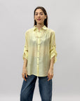 Camicia con maniche arrotolate