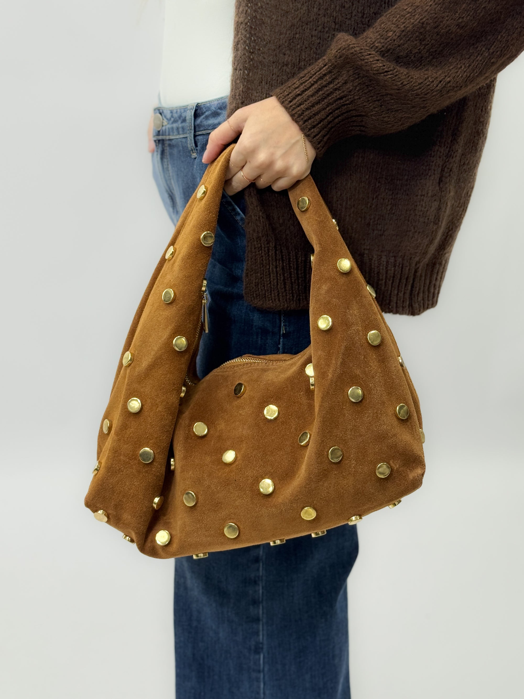 Borsa “Nora” in vera pelle scamosciata con borchie – Made in Italy