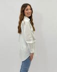 Camicia con fiocco laterale