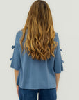 Cardigan leggero con fiocchetti