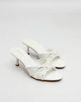 Mules con fiocco in vernice