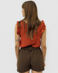Maglia Smanicata con Volant sulle Spalle