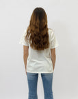 T-shirt con scritta "l'essenziale è invisibile agli occhi"