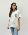 T-shirt con scritta "l'essenziale è invisibile agli occhi"