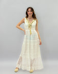 Abito lungo in pizzo con paillettes