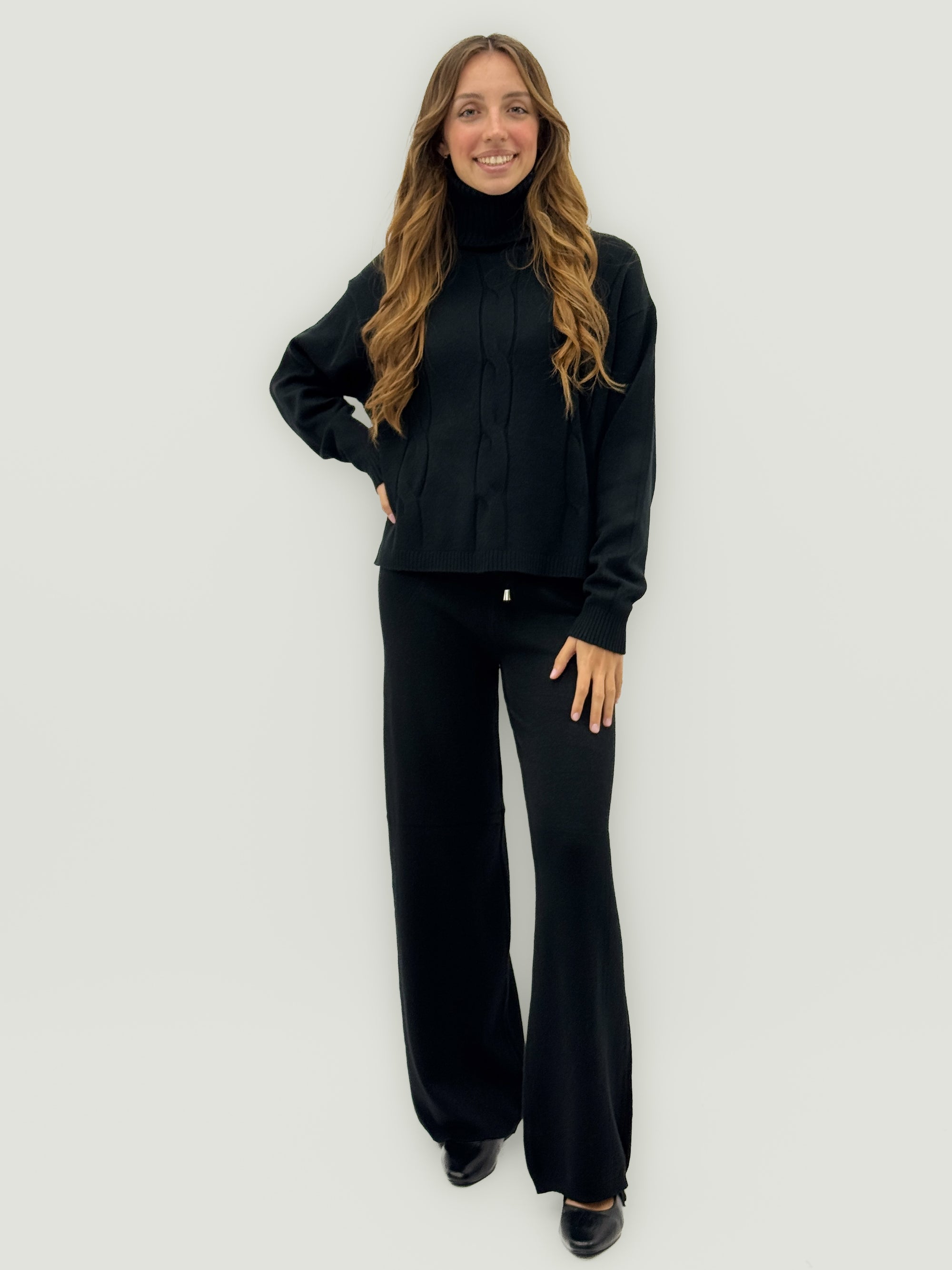 Completo in maglia con collo alto – Eleganza e comfort quotidiano
