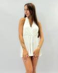 Tuta corta con scollo halter