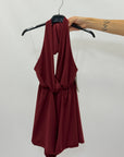 Tuta corta con scollo halter