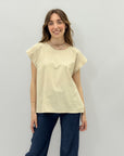 Maglia con bottoni laterali