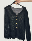 Cardigan in maglia con bottoni e tasche frontali