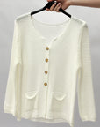 Cardigan in maglia con bottoni e tasche frontali