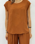 Completo top sfrangiato e pantalone palazzo