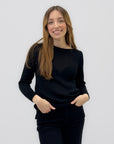 Maglia girocollo con bottoni decorativi sul retro