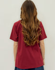 T-shirt con cuciture decorative e fondo asimmetrico