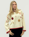 Maglione con applicazione a pois ricamati