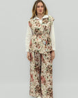 Completo gilet e pantalone floreale con cintura