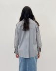 Camicia a righe con dettagli pizzo