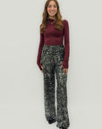 Pantaloni a palazzo con paillettes all-over